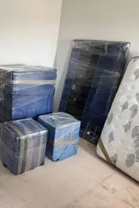 Furniture wrapped and protected by professional moving services