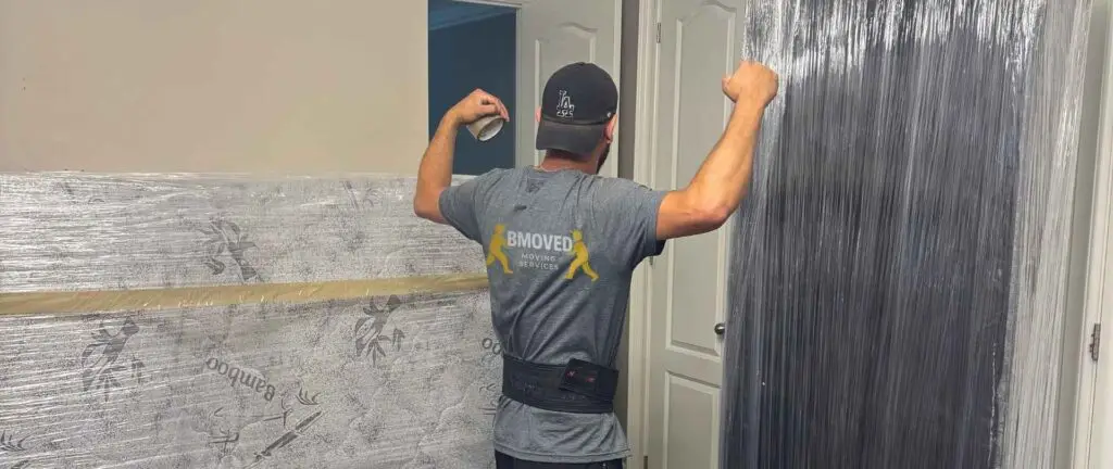 MOVED long-distance moving truck traveling from Toronto to major Canadian cities including Vancouver, Calgary, Edmonton, Ottawa, and Montreal